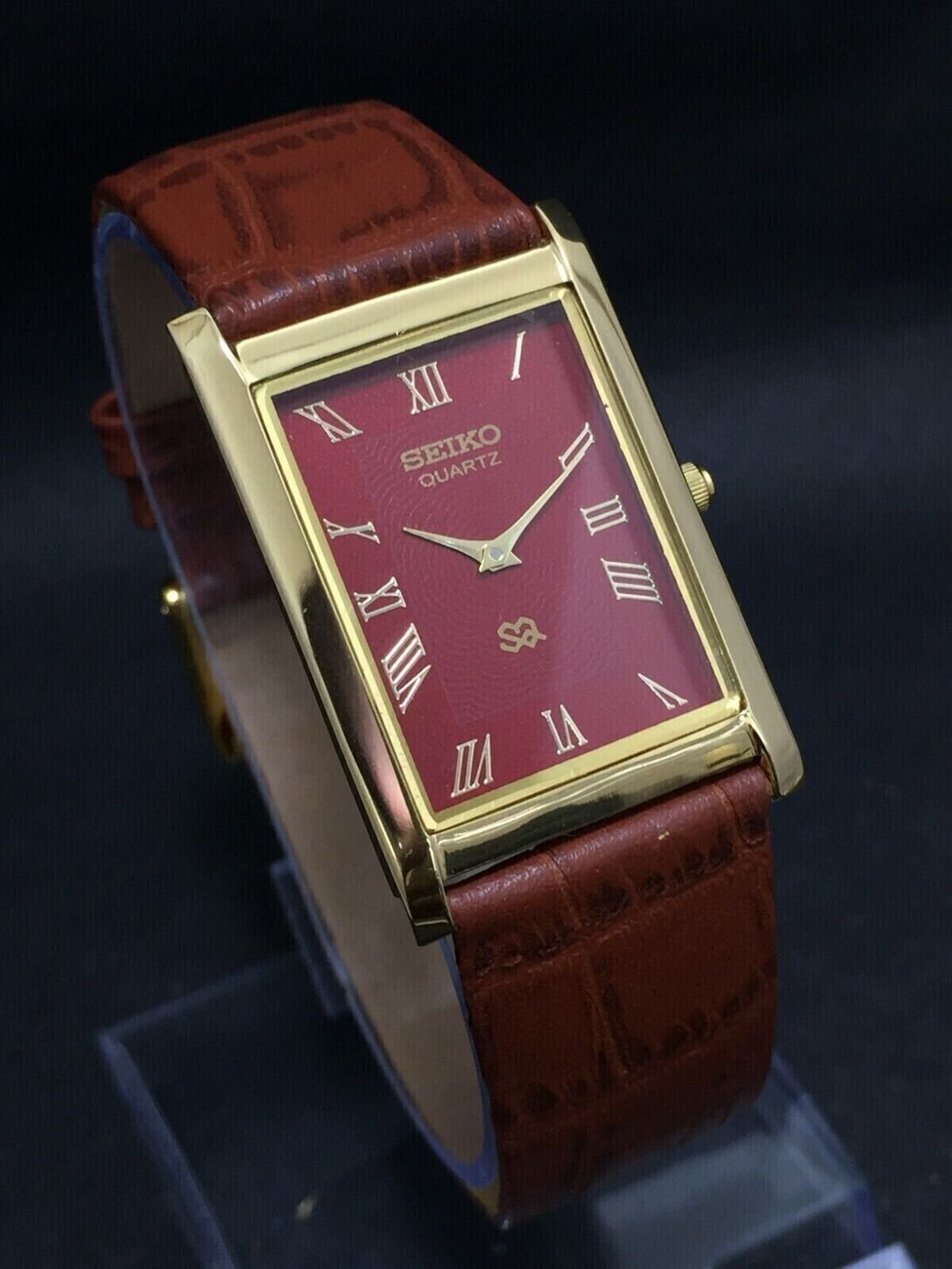 Seiko Slim Quartz Red Face Brown Band Mens watch A021`