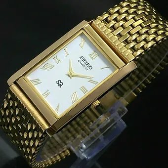 Seiko Slim Rectangular White Face Golden Band Mens watch A0122